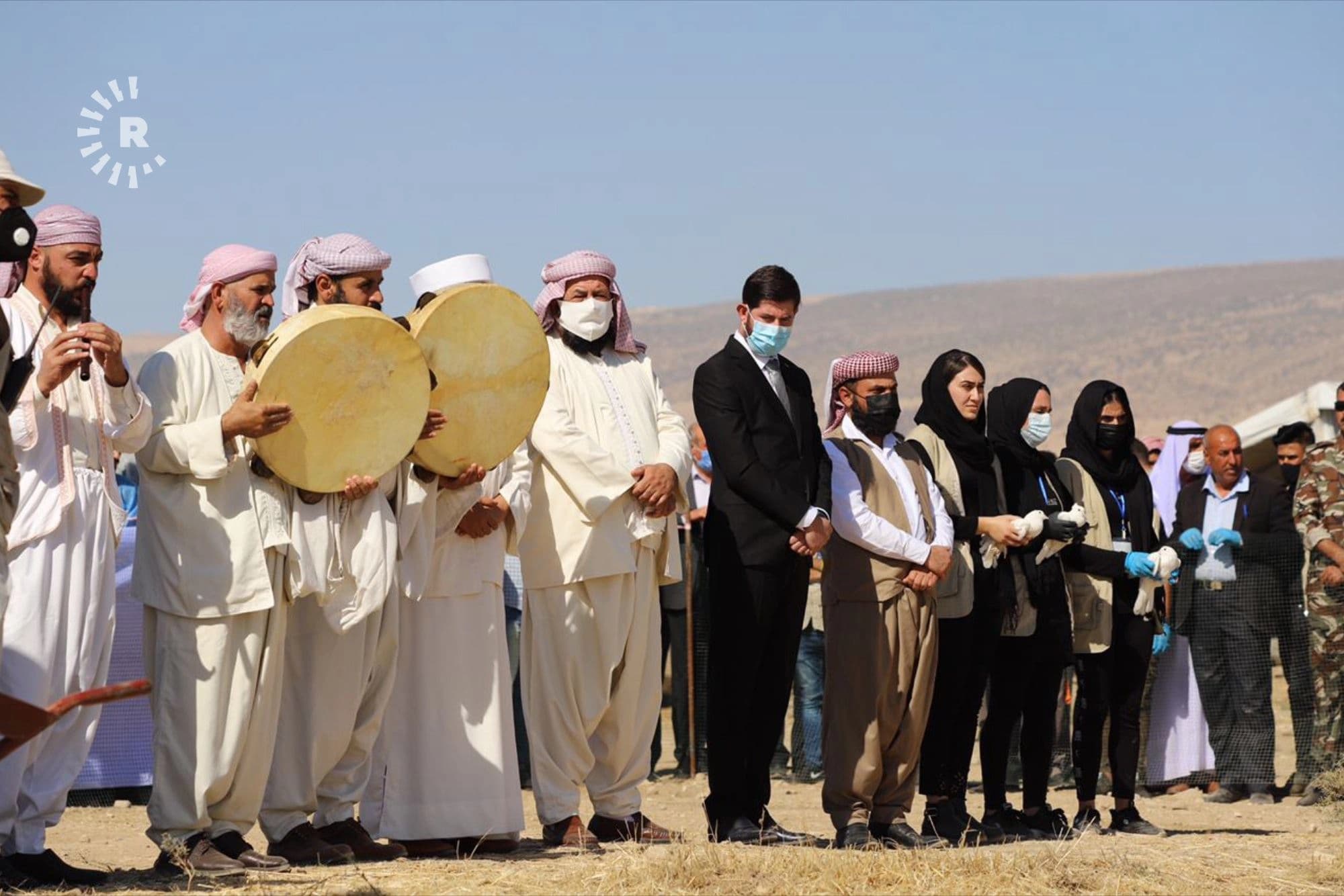 Yezidis gather in the village of Solagh, on the southern side of mount Sinjar, for a ceremony marking the start of the exhumation of mass graves by the Islamic State (ISIS) on October 24, 2020. Photo: Fazel Hawramy / Rudaw