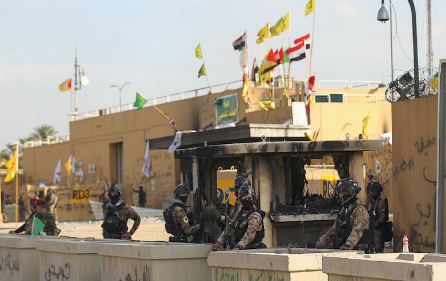 Iraqi security forces in front of the US embassy in Baghdad, after it was stormed by PMF supporters, on January 1, 2020. Photo: Ahmad al-Rubaye/AFP