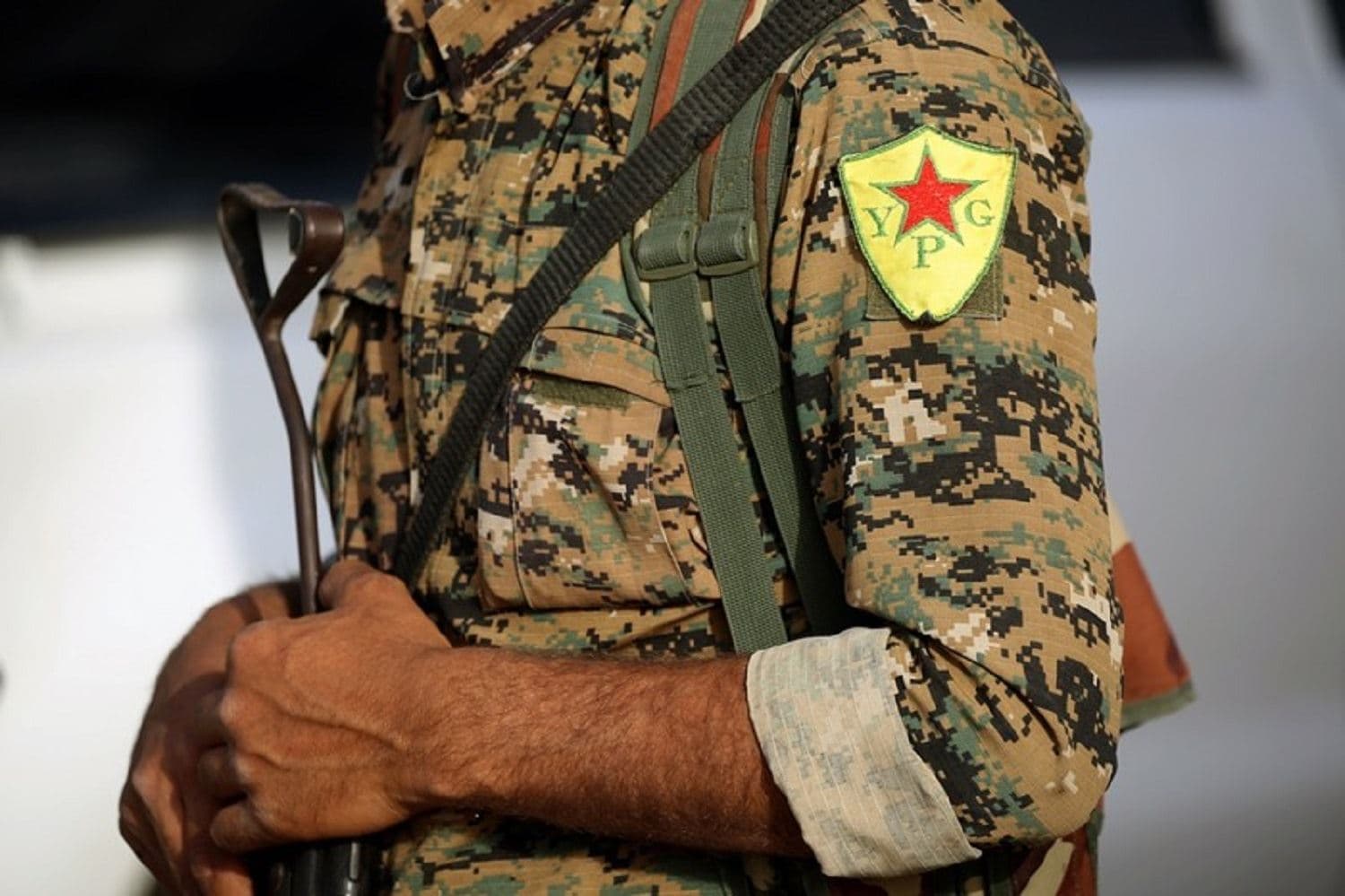 The insignia of the People's Protection Units (YPG) on a member's uniform. File photo: Delil Souleiman/AFP