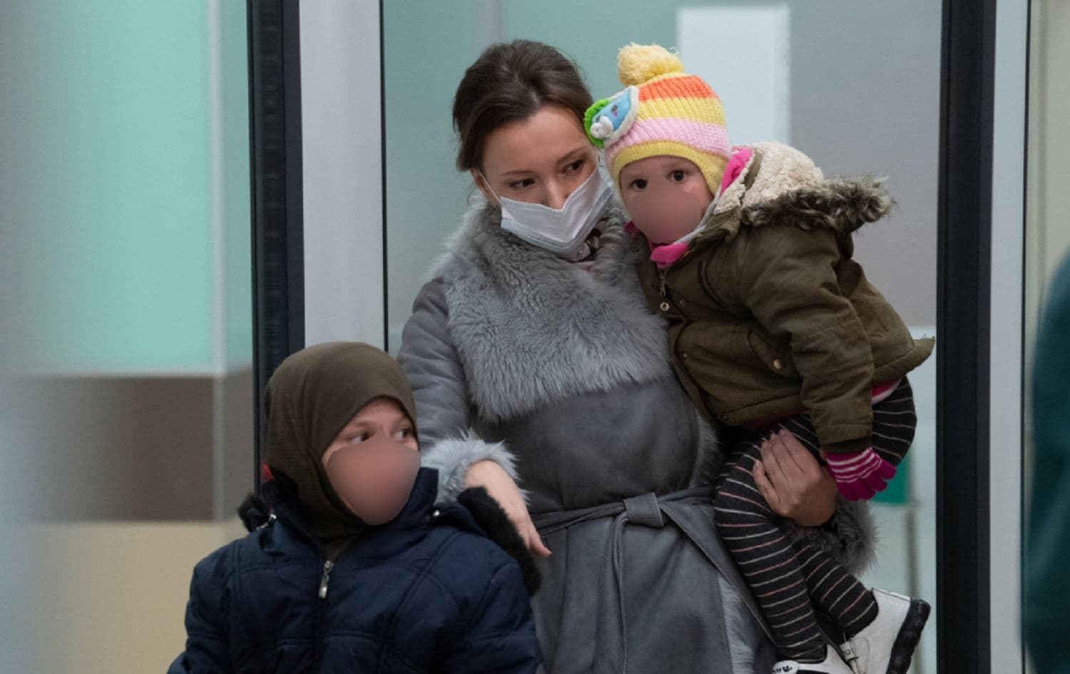 Russia's Commissioner for Children's Rights Anna Kuznetsova (centre) with two of the 19 children repatriated from northeast Syria. Photo: Commissioner for the Rights of the Child