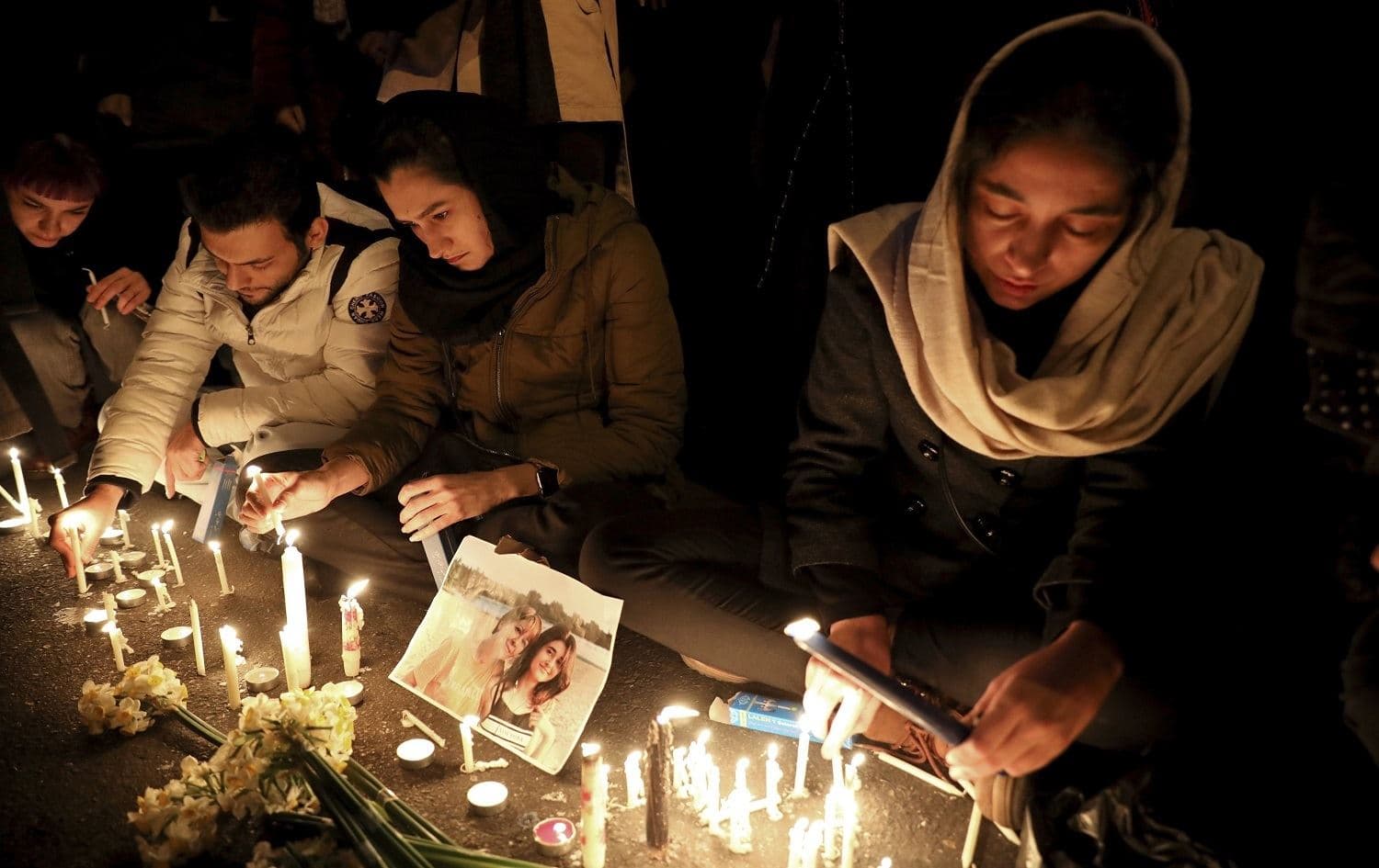 People gather to remember victims of the Ukrainian Airlines flight 752 crash at Tehran's Amiri Kabir university on January 11, 2020. File photo: AP