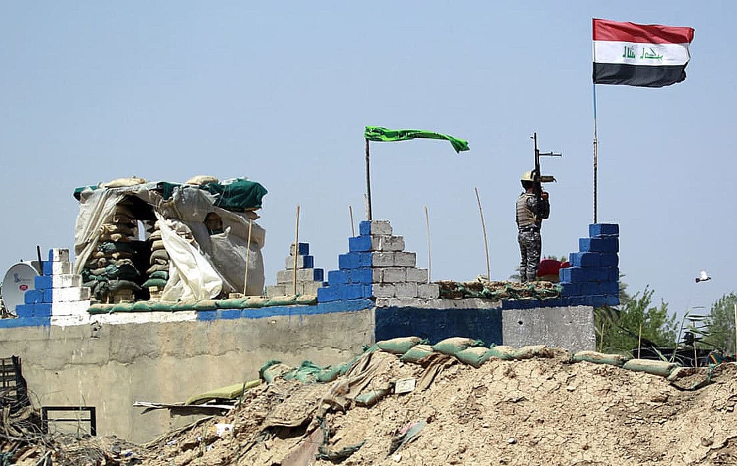 Iraqi government forces guard the Jurf al-Sakher area on May 24, 2015. File photo: Haidar Hamdani/AFP