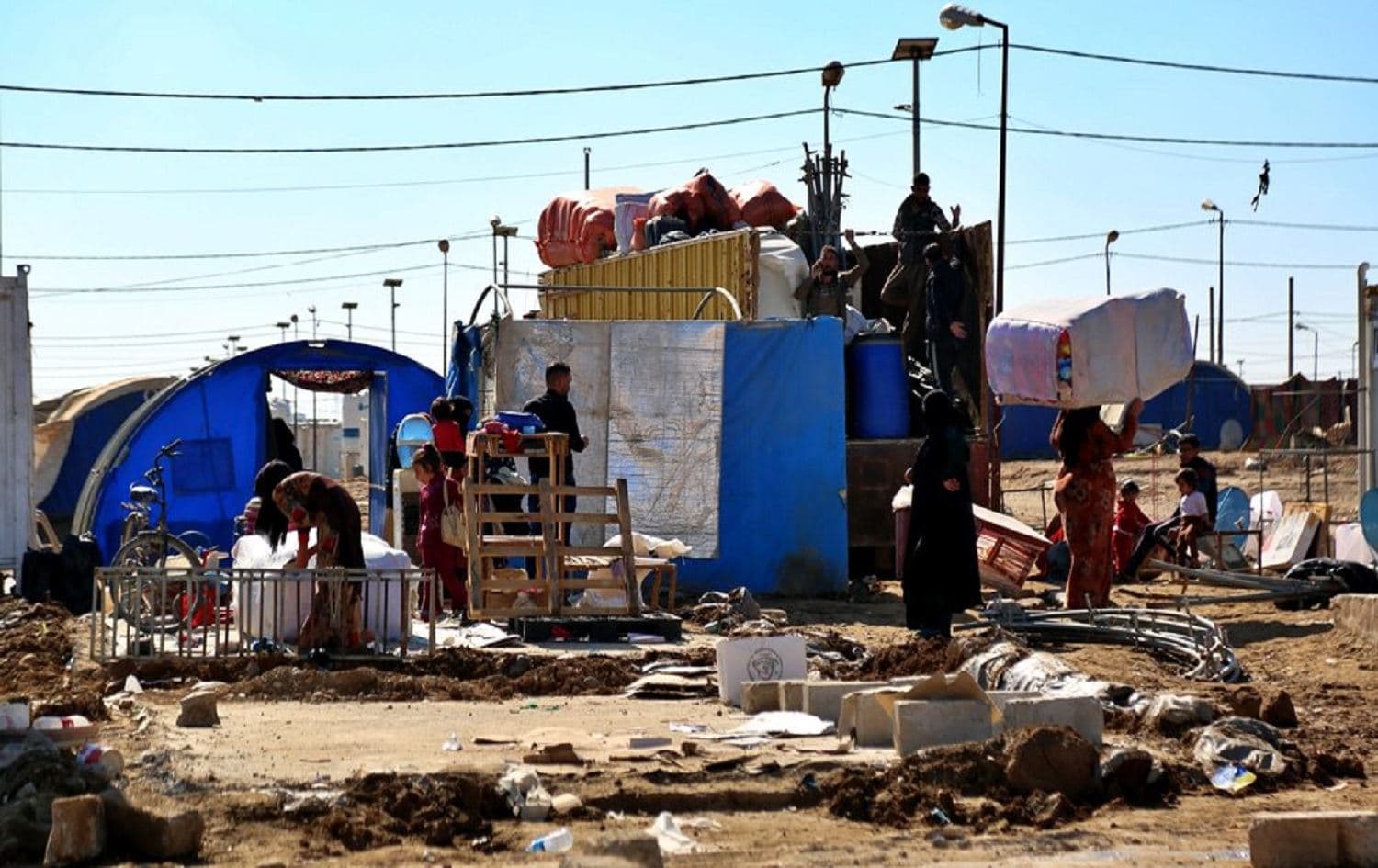 Displaced Iraqis pack up in preparation to return to their homes in Jadah 5 camp on February 4, 2021. Photo:Farid Abdulwahed/AP