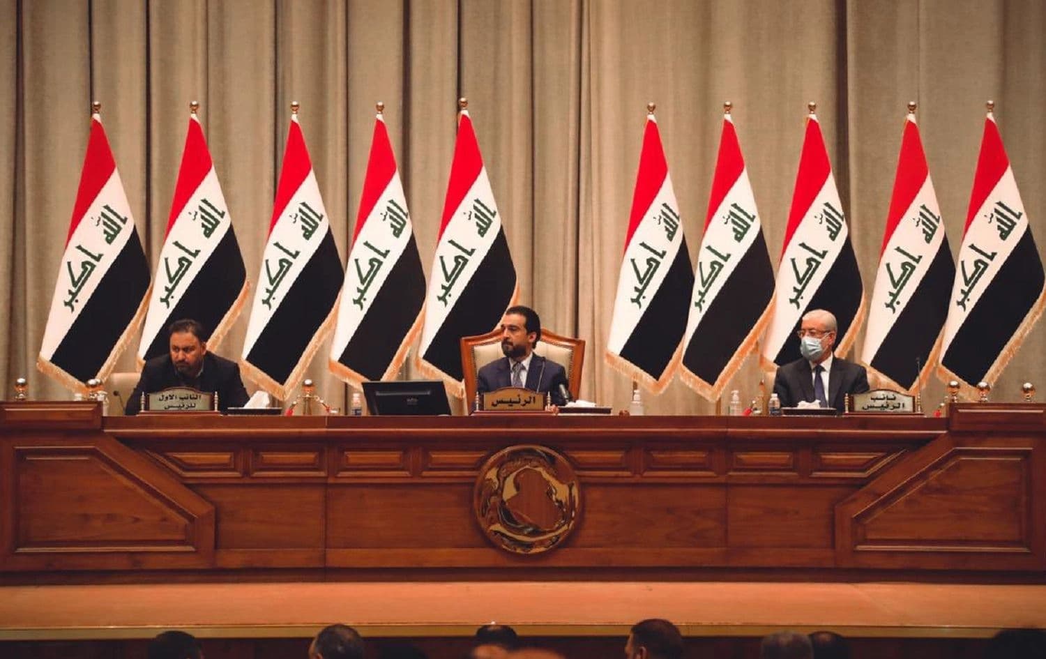 Iraqi Parliament Speaker Mohammed al-Halbousi (centre) chairs a parliamentary session in Baghdad on March 18, 2021. Photo: handout/Speaker’s media office