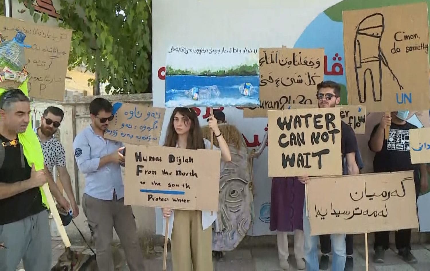 Environmental activists in Sulaimani on June 19, 2021 warn the Kurdistan Region will face a crisis because of water shortages. Photo: Rudaw