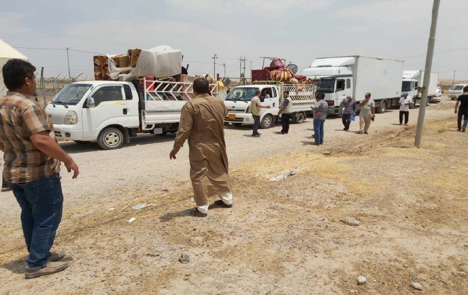 Families leaving Khazer camp. Photo: Ministry of Migration and Displacement/Facebook