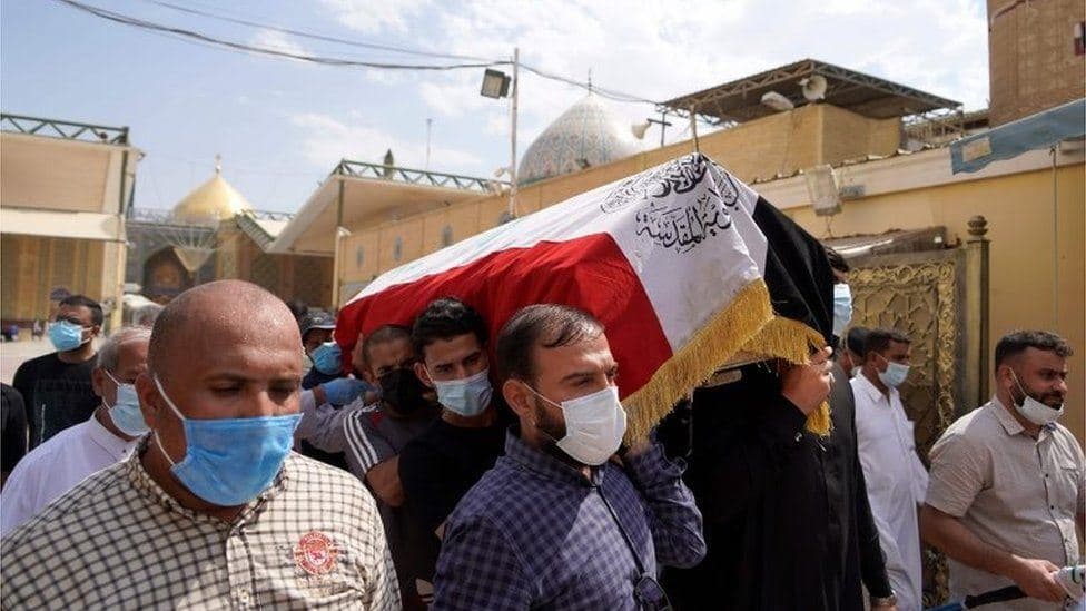 Mourners carry the coffin of Husham al-Hashimi after his assassination in Baghdad on July 6, 2020. Photo: AFP