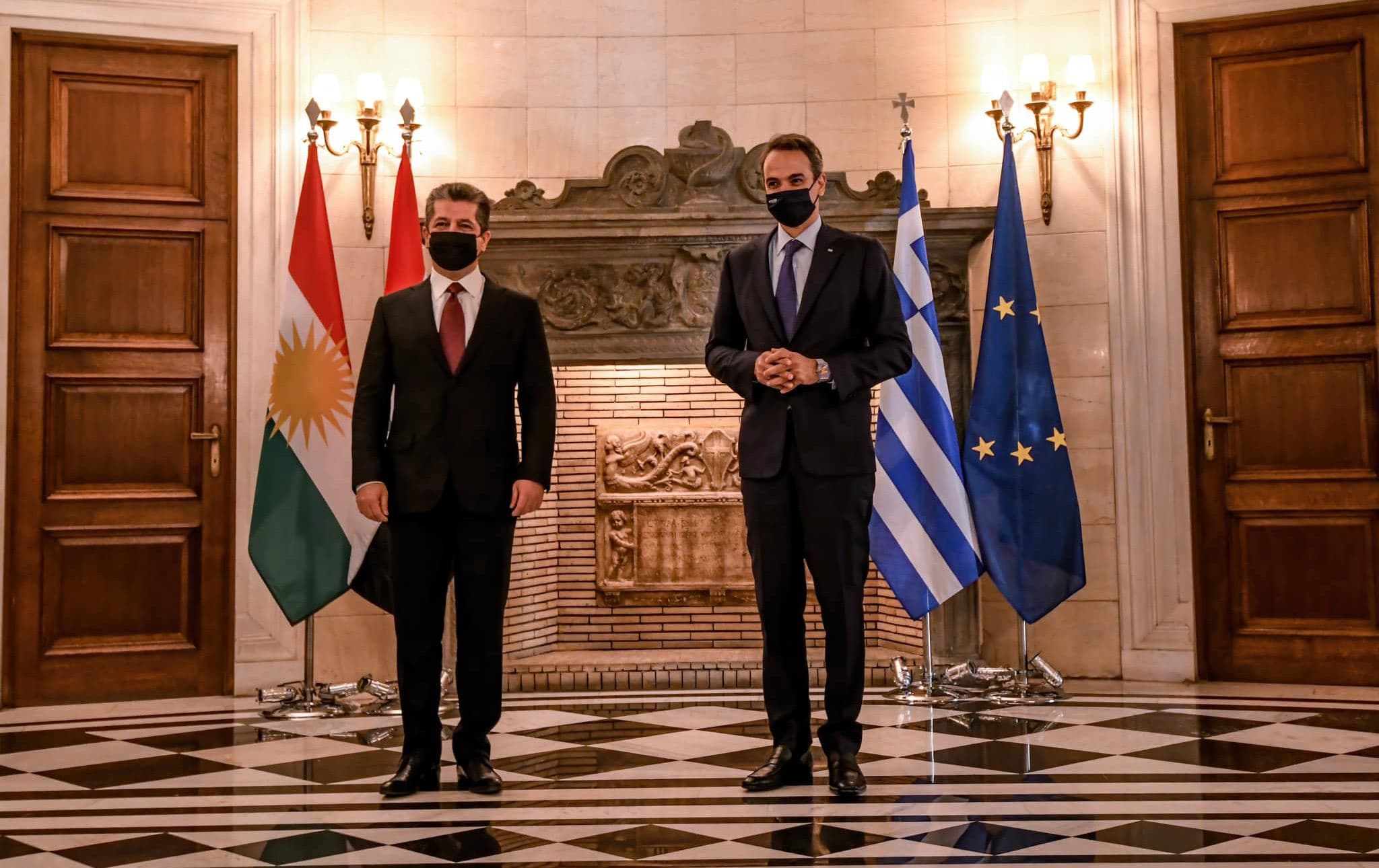 کیریاکۆس میتسۆتاکیس سەرۆکوەزیرانی یۆنان و مەسرور بارزانی، سەرۆکی حکومەتی هەرێمی کوردستان.