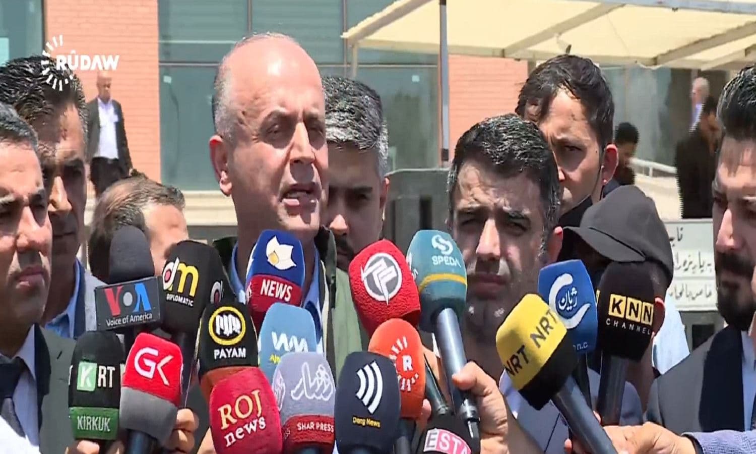 Lawyer Bashdar Hassan speaking to reporters in Erbil on July 12, 2021. Photo: screenshot