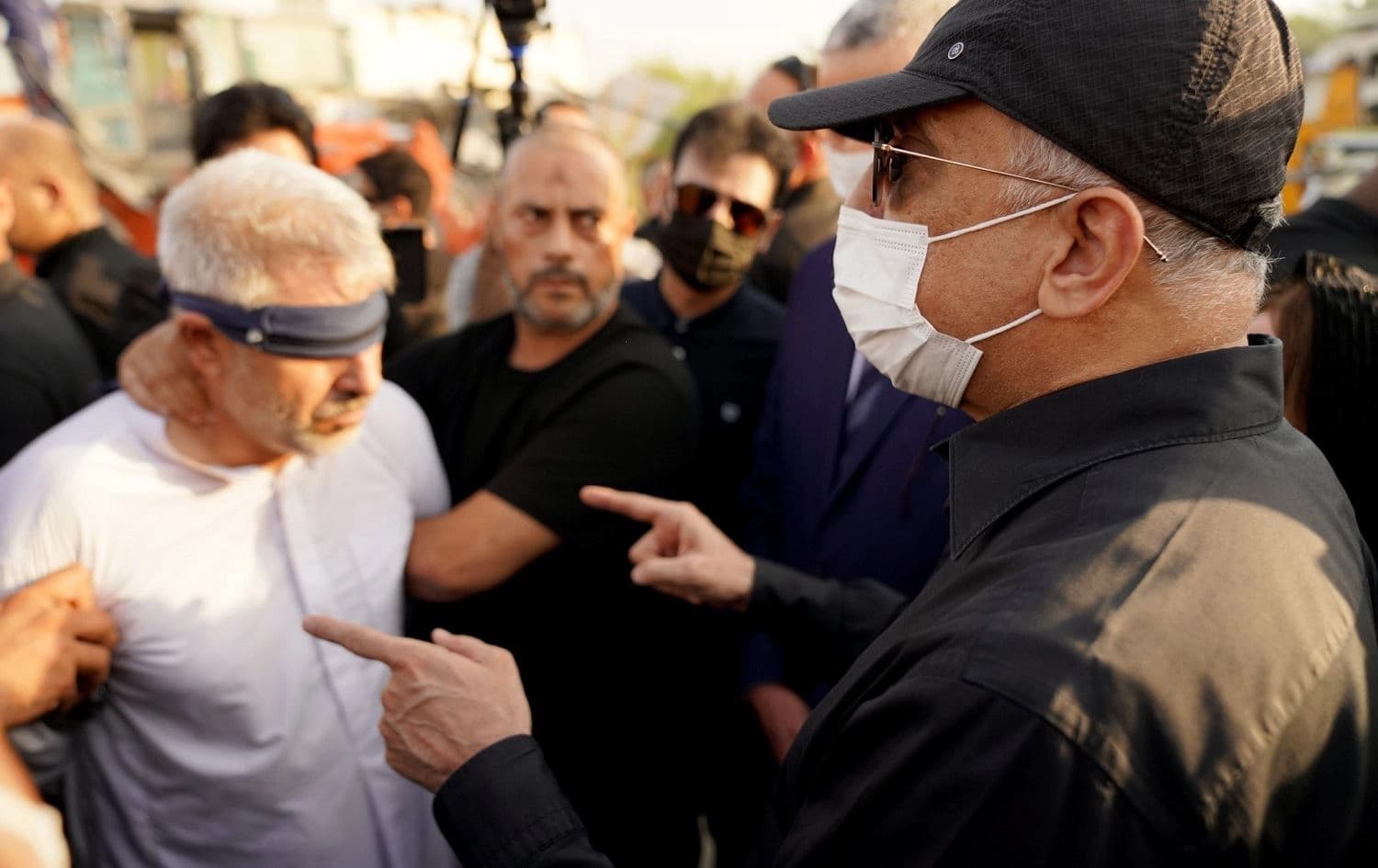 Iraqi Prime Minister Mustafa al-Kadhimi (right) met with a man accused of killing the mayor of Karbala, on August 11, 2021. Photo: handout/PM office