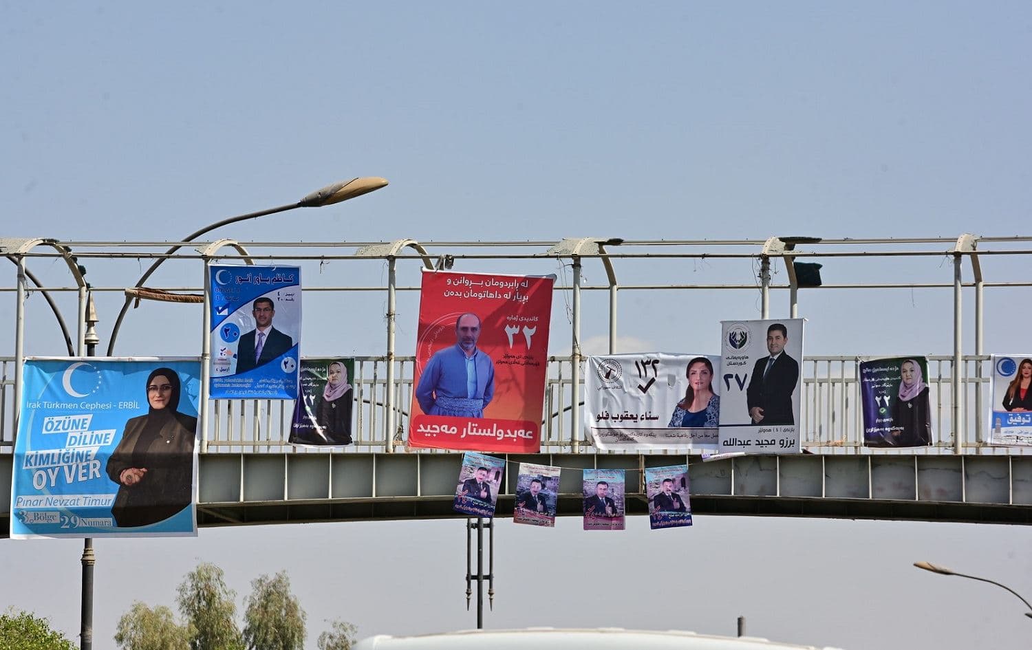 Election campaign posters hang from a pedestrian bridge in Erbil. Photo: Bilind T. Abdullah/Rudaw