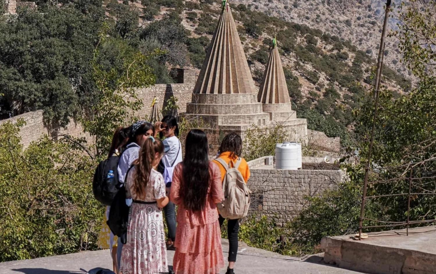 People walk towards the Temple of Lalish, near the Iraqi Kurdish city of Dohuk in Iraq. Photo: Ismail Adnan / AFP