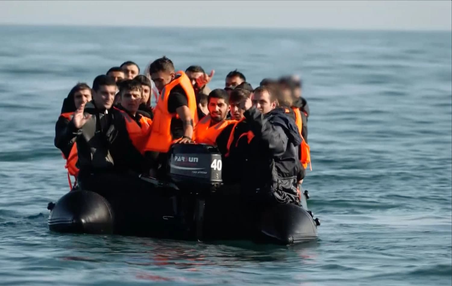 Migrants seen leaving France on a dinghy for UK on October 8, 2021. Photo: Associated Press