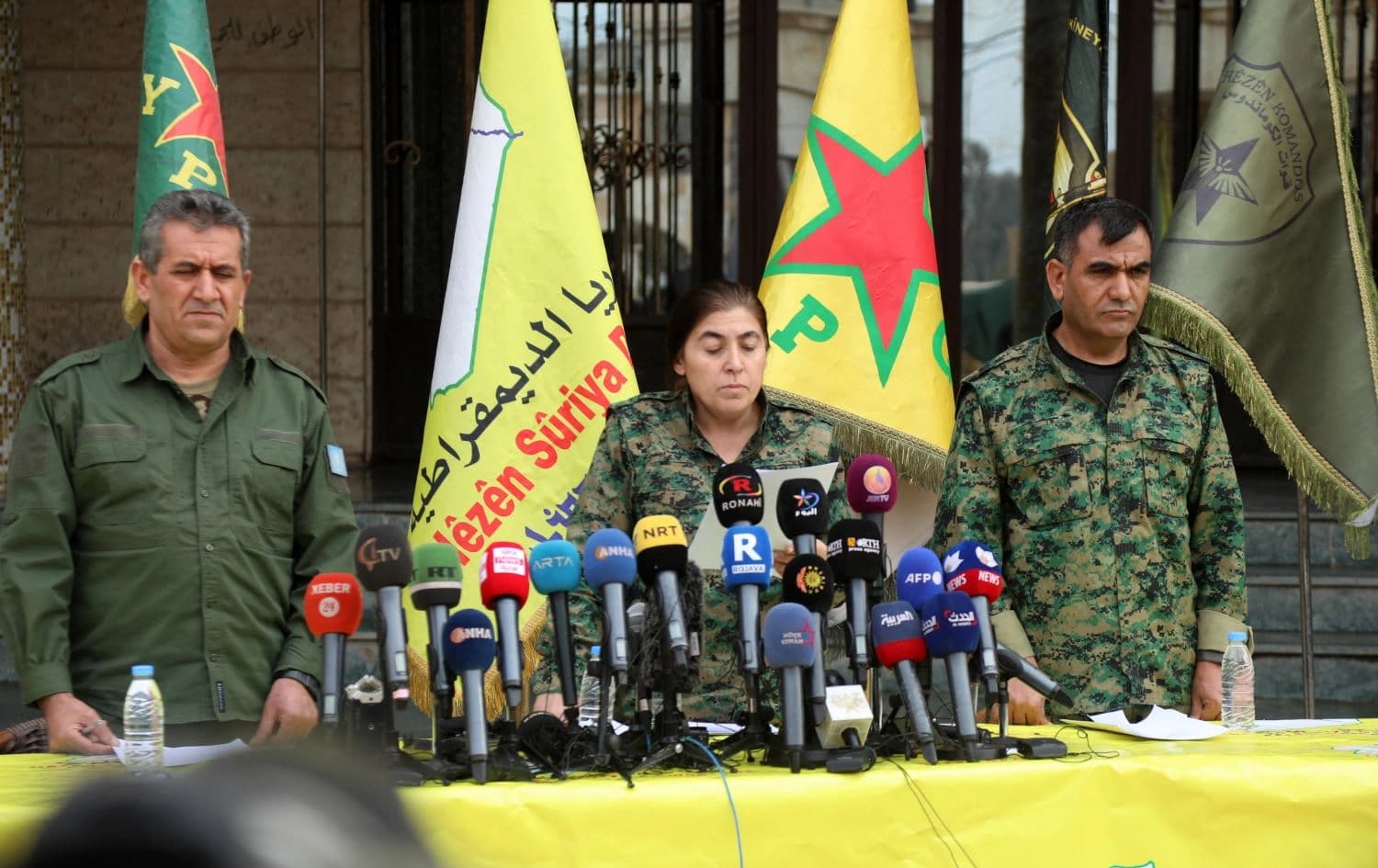 Members of the Syrian Democratic Forces (SDF) give a press conference in Syria's northeastern city of Hasaka in which they said the Ghweran prison is under their control, on January 31, 2022. File Photo: AFP