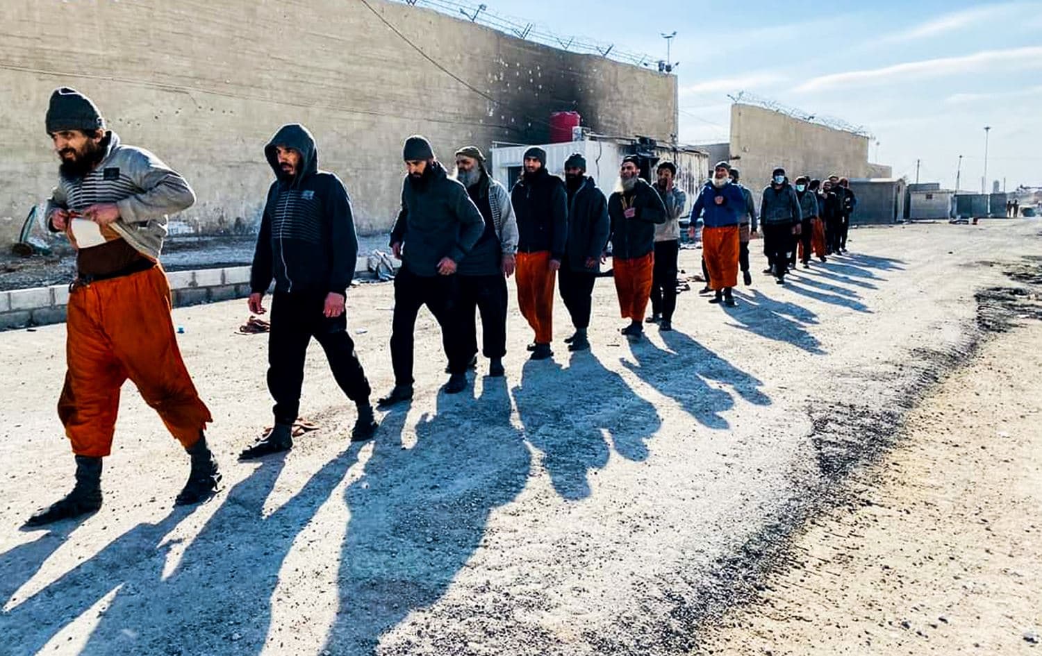 ISIS prisoners who were recaptured by the SDF after the prison break attempt in Hasaka on January 20, 2022. Photo: SDF