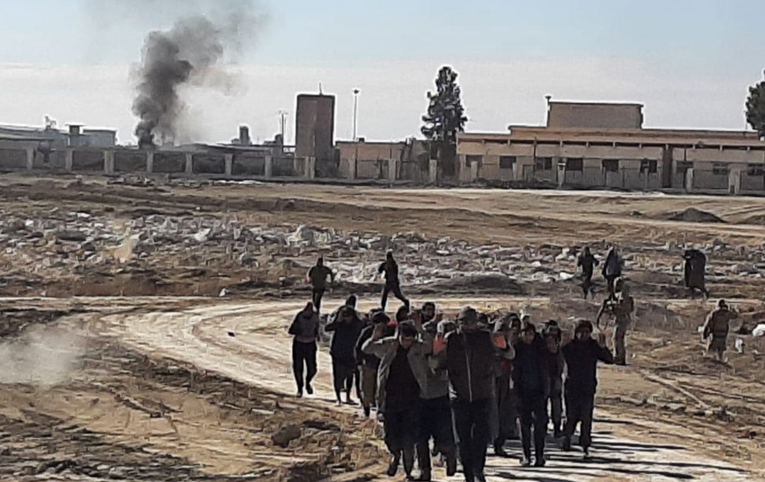 Some Islamic State fighters surrendered after clashing with Kurdish-led Syrian Democratic Forces at al-Sina’a prison in northeast Syria (Rojava). Photo: Syrian Democratic Forces