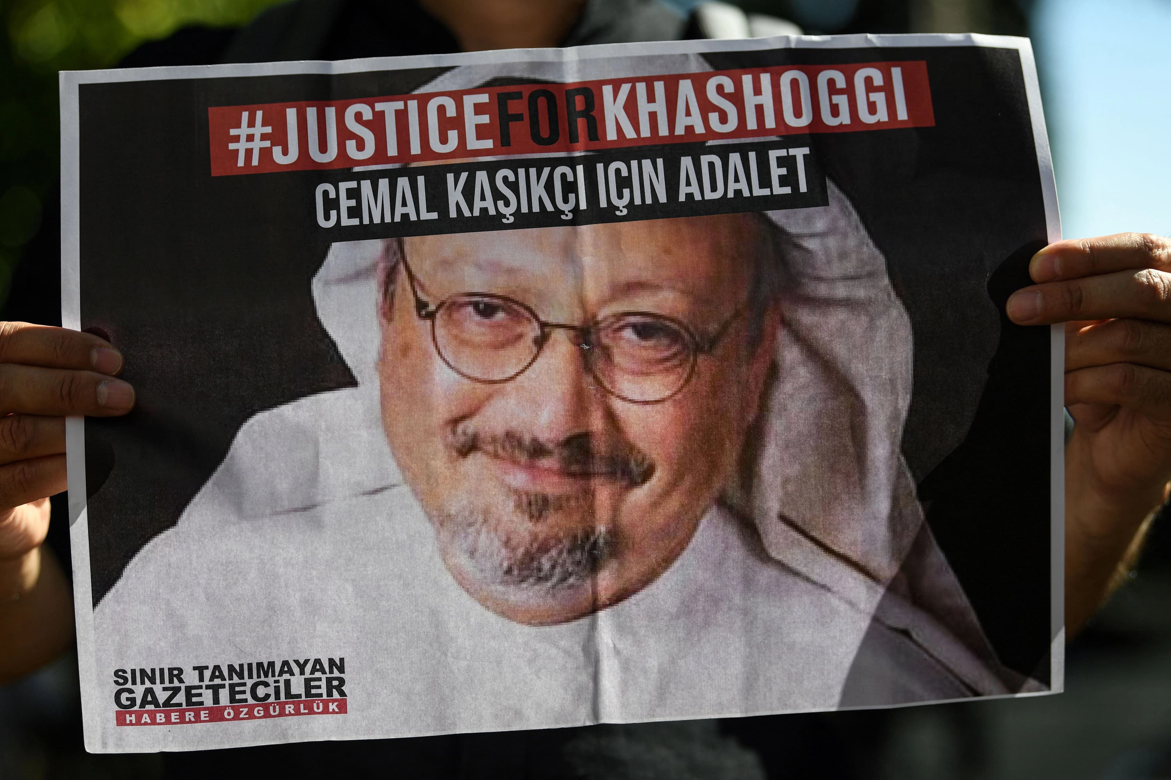 Friends of murdered Saudi journalist Jamal Khashoggi hold posters bearing his picture in front of the Saudi consulate in Istanbul on October 2, 2020. File photo: AFP