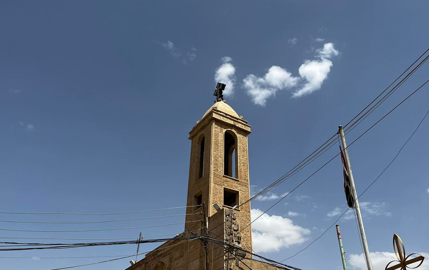 Bell tower of St. Shmoni Church in Bartella, Nineveh Plains, on April 14, 2022. Photo: Dilan Sirwan/Rudaw