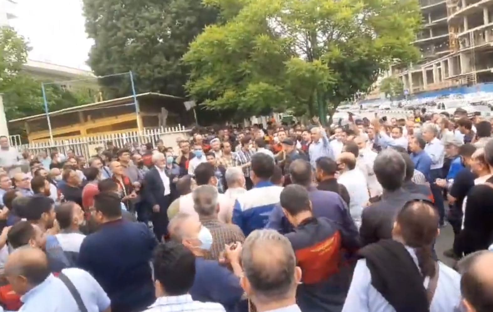 Bus drivers and workers of the Tehran Bus Company strike for higher wages in Iran's capital on May 16, 2022. Photo: Iran News Wire/Twitter