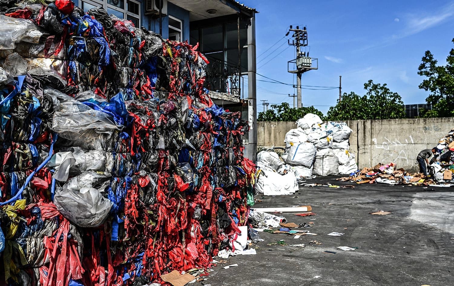 Stacks of plastic waste collected near at a plastic recycling plants in Kartepe on May 11, 2022. Photo: Ozan Kose/AFP
