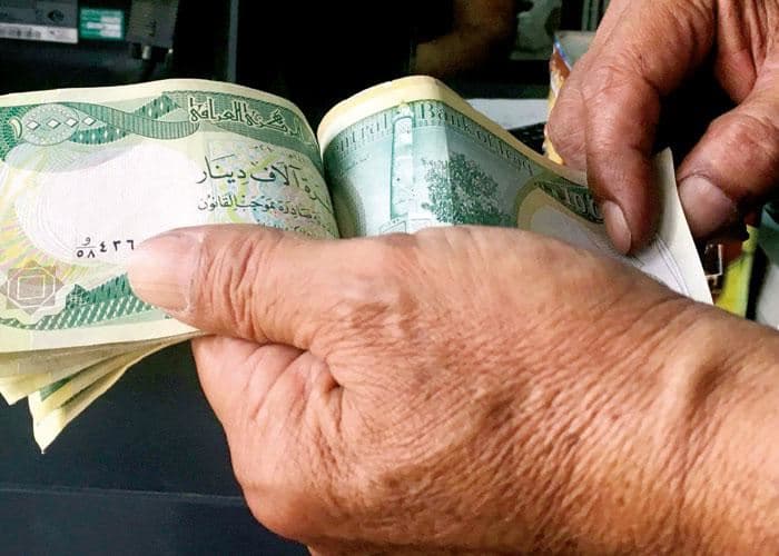 10,000 Iraqi dinar banknotes. Photo: AFP/file
