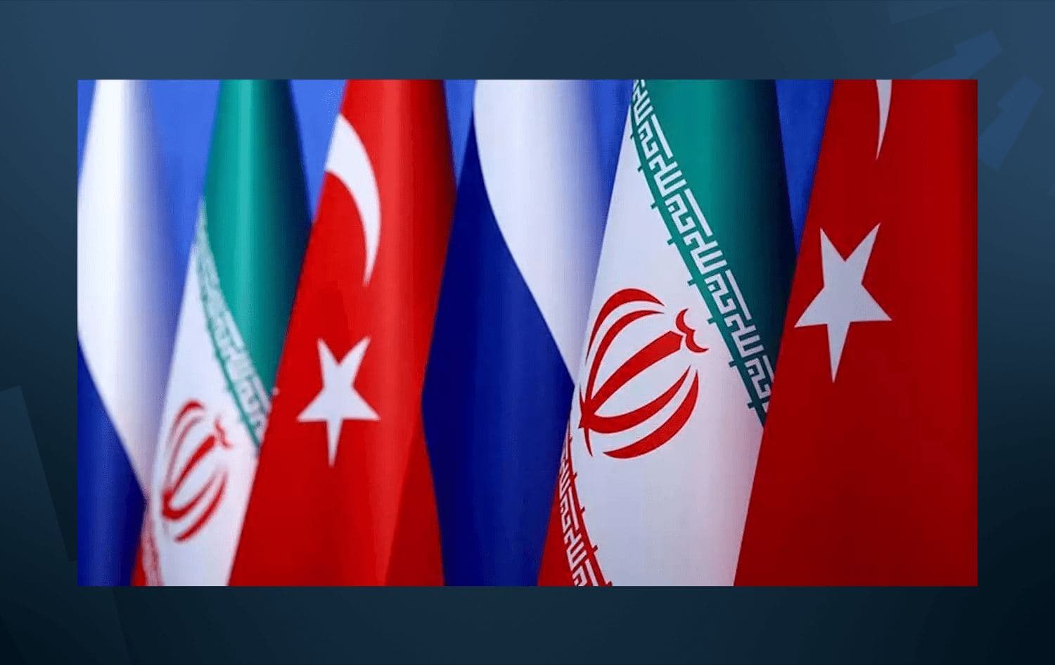 Flags of Russia, Iran and Turkey are seen during a joint press conference after the trilateral summit between Turkey, Iran and Russia, on September 7, 2018, in Tehran, Iran. Photo: Anadolu Agency