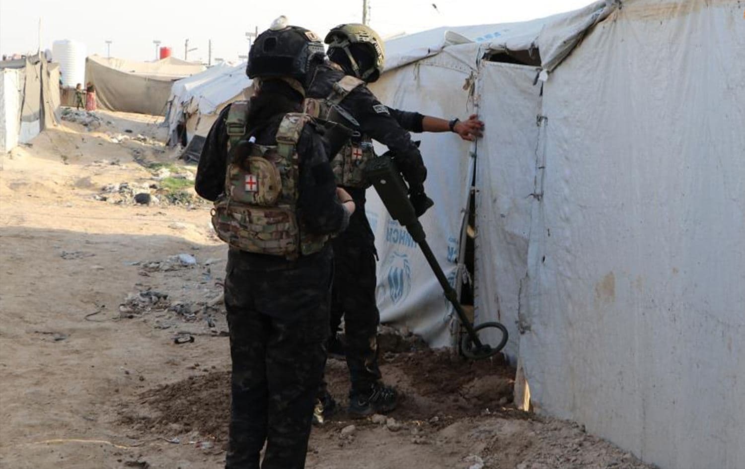 Members of the internal security forces conducting a security operation in al-Hol camp on August 25, 2022. Photo: Hawar News Agency