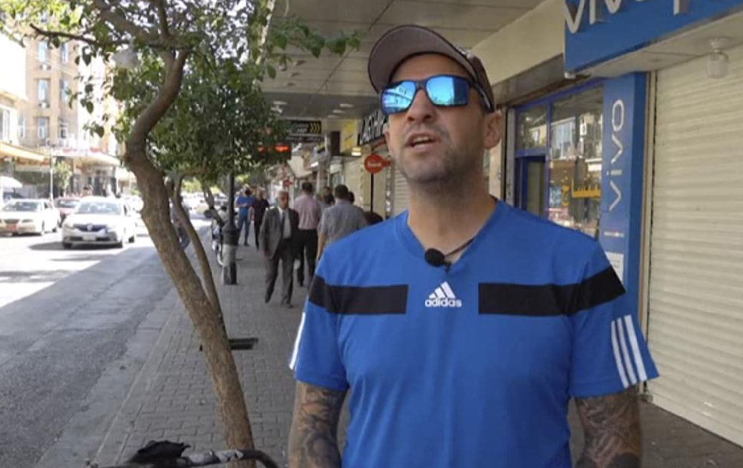 In this frame grab from video, 41-year-old Santiago Sánchez, a Spanish man who was documenting his travel by foot from Madrid to Doha for the 2022 FIFA World Cup, speaks to The Associated Press on a street, in Sulaimani, Kurdistan Region, Sept. 28, 2022. Photo: AP