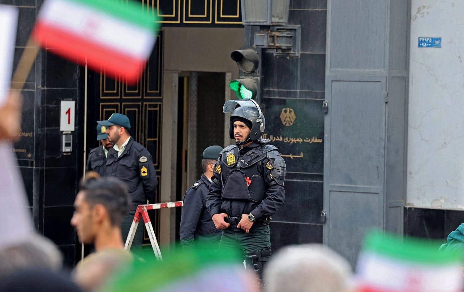 Iranian security forces stand guard outside the German embassy headquarters in Iran's capital Tehran on November 1, 2022 as protesters gather for an anti-German demonstration, condemning Germany's support of Berlin-based Iranian opposition TV stations and anti-government protests in Iran. Photo: Atta Kenare/AFP