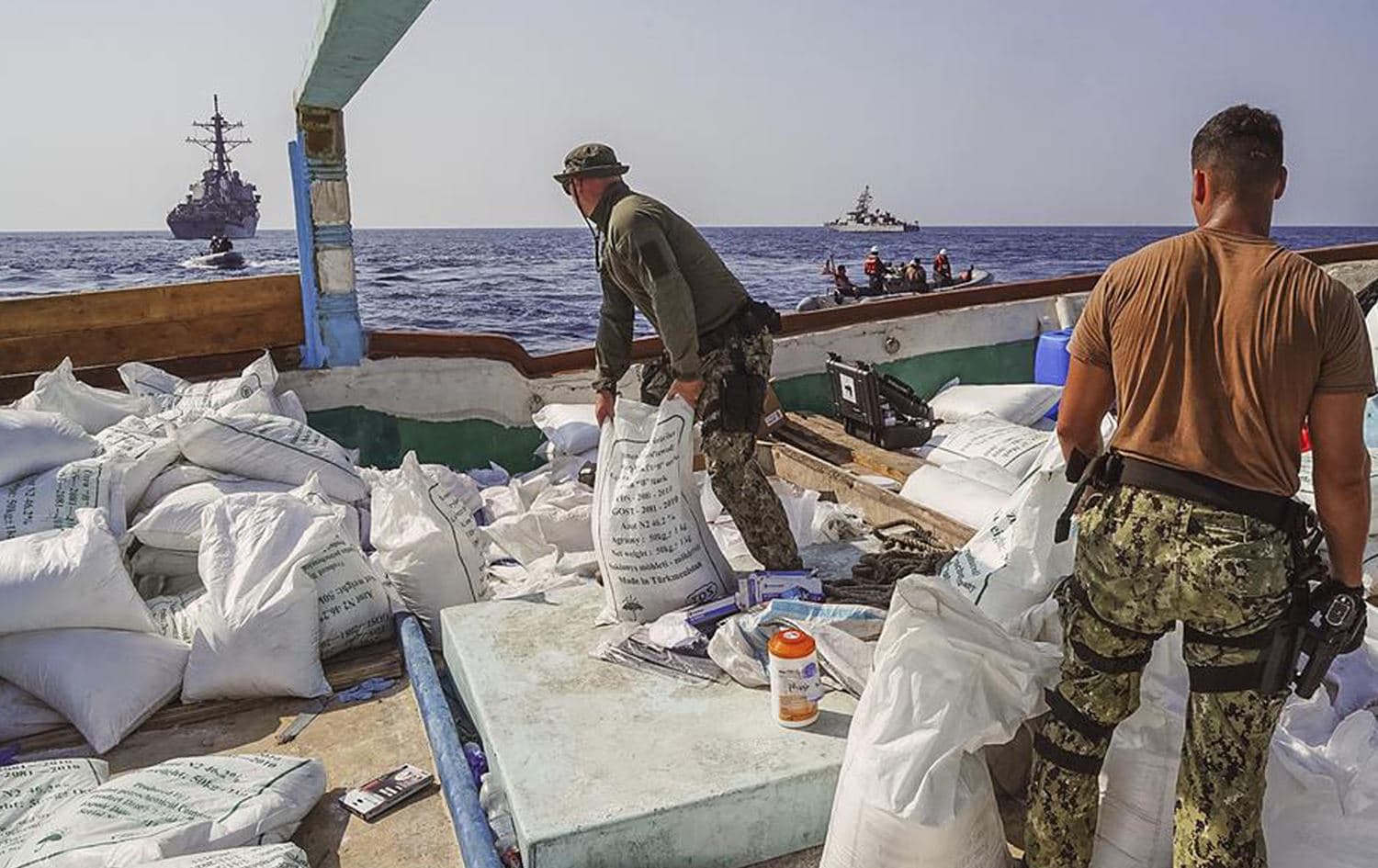 US Navy finds sailors inventory urea and ammonium perchlorate on a dhow intercepted in the Gulf of Oman on Nov. 9, 2022. Photo: Sonar Technician 1st Class Kevin Frus/U.S. Navy/AP