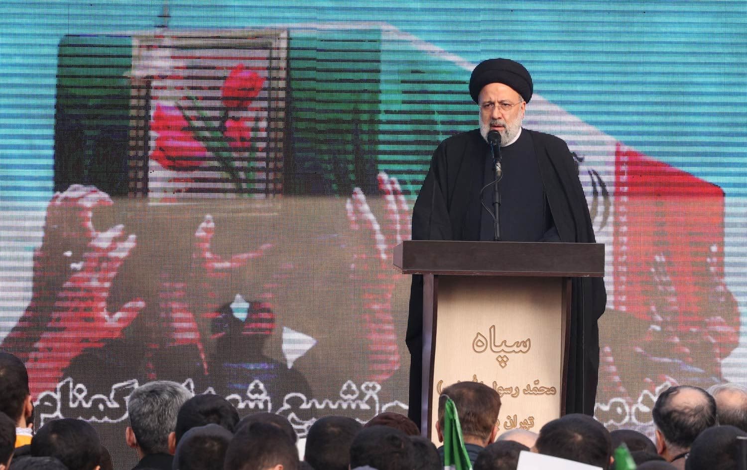 Iran's President Ebrahim Raisi speaks in Tehran on December 27, 2022 following a funeral procession carrying the remains of 200 Iranian soldiers recovered from former battlefields of the Iran-Iraq war (1980-1988). Photo: AFP