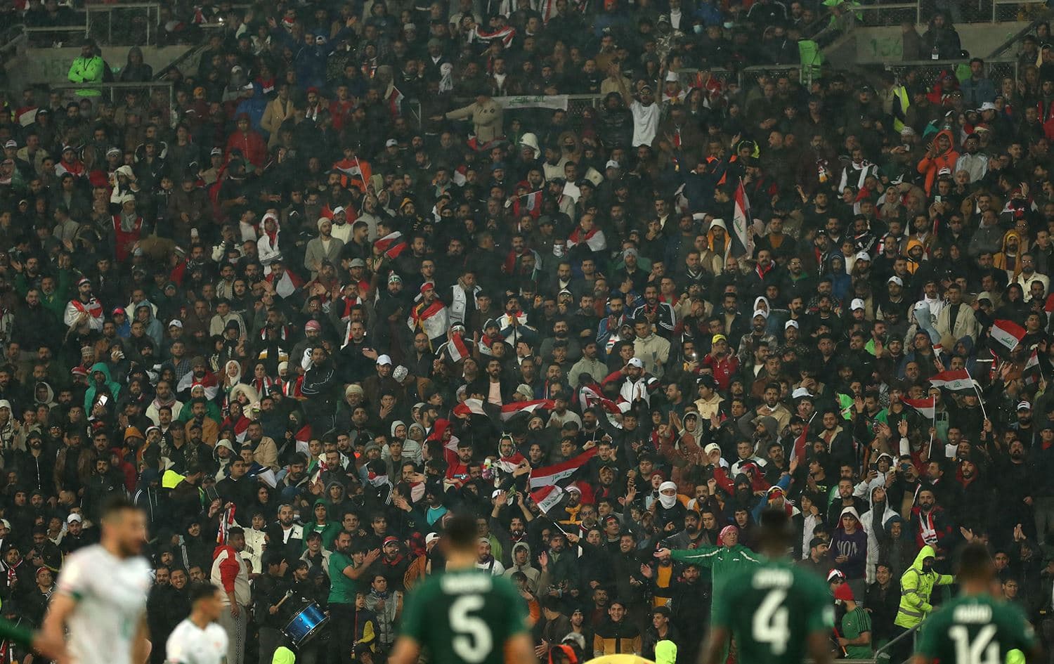 Supporters cheer from the stands during the Arabian Gulf Cup football match between Iraq and Saudi Arabia at the Basra International Stadium in Iraq's eponymous southern city on January 9, 2023. Photo: AFP