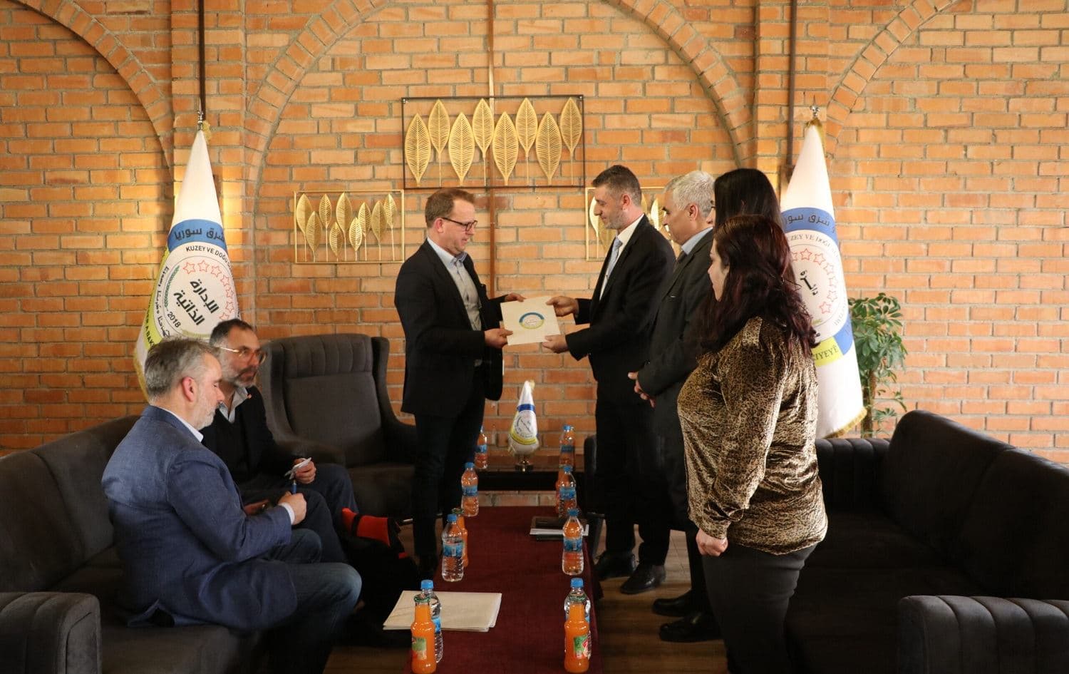 Canadian officials, left, including Sebastien Beaulieu, an executive at Global Affairs Canada, met with officials of the Kurdish-led Autonomous Administration of North and East Syria (AANES) in Qamishli on April 5, 2023. Photo: handout/AANES