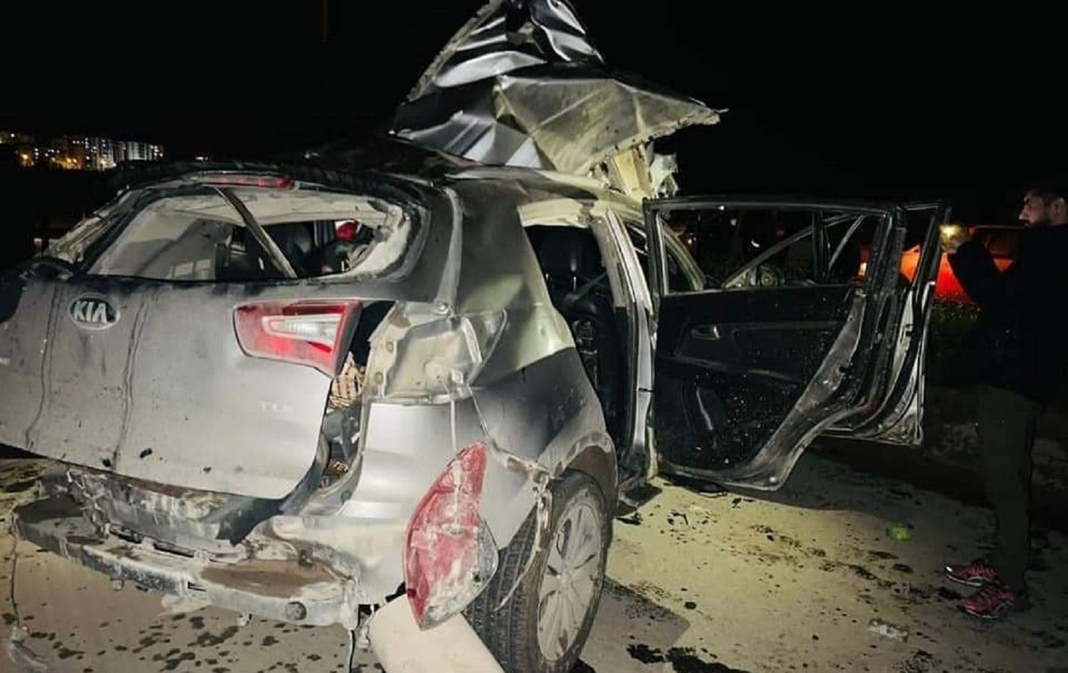 The mangled wreckage of a car in Qamishli, northeast Syria, that was reportedly hit by a Turkish drone strike, killing an SDF commander. Photo: Syrian Observatory of Human Rights