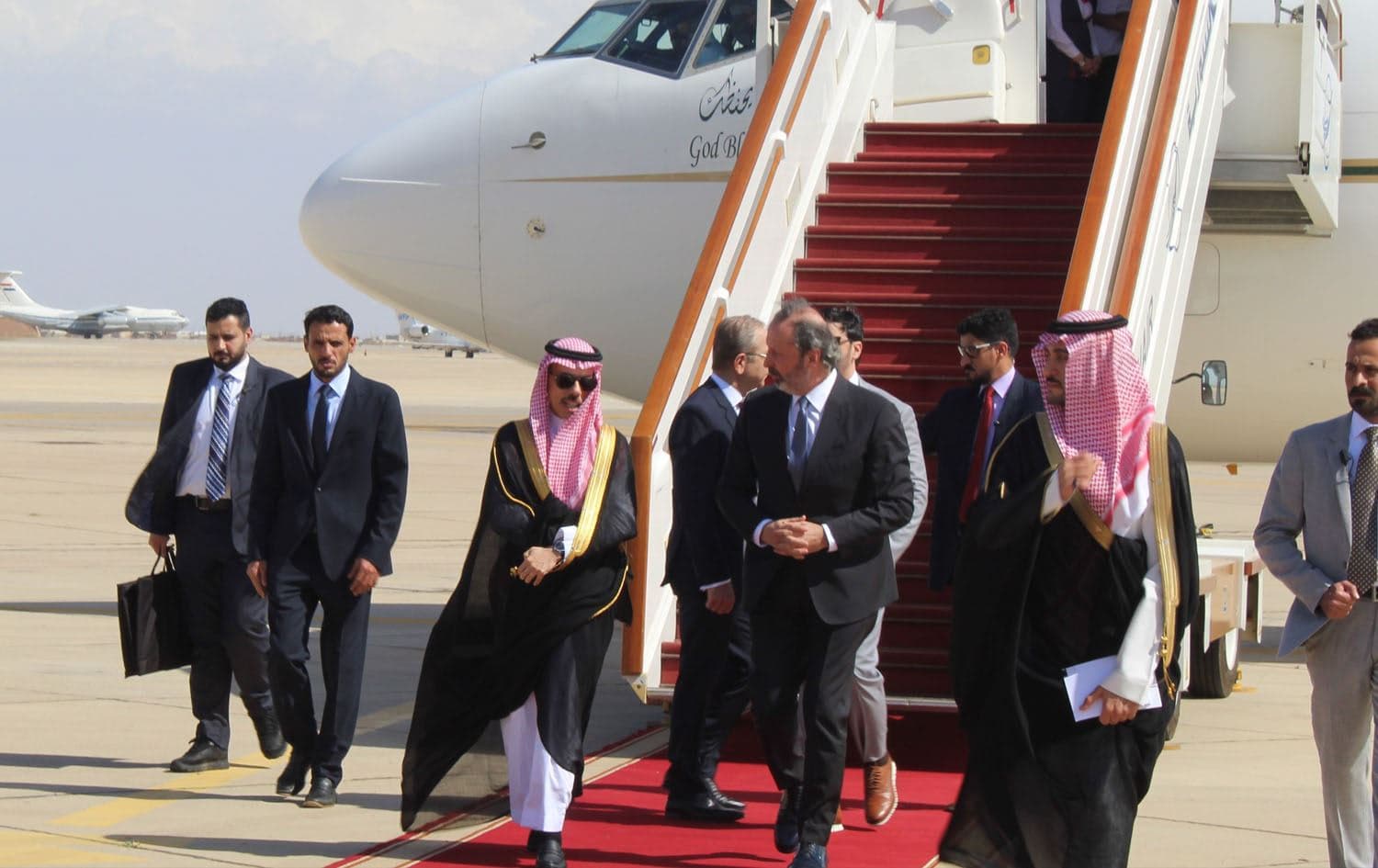 Saudi Foreign Minister Prince Faisal bin Farhan (left) was received by the Syrian Minister of Presidential Affairs Mansour Azzam (right) in Damascus on April 28, 2023. Photo: handout/Syrian Foreign Ministry