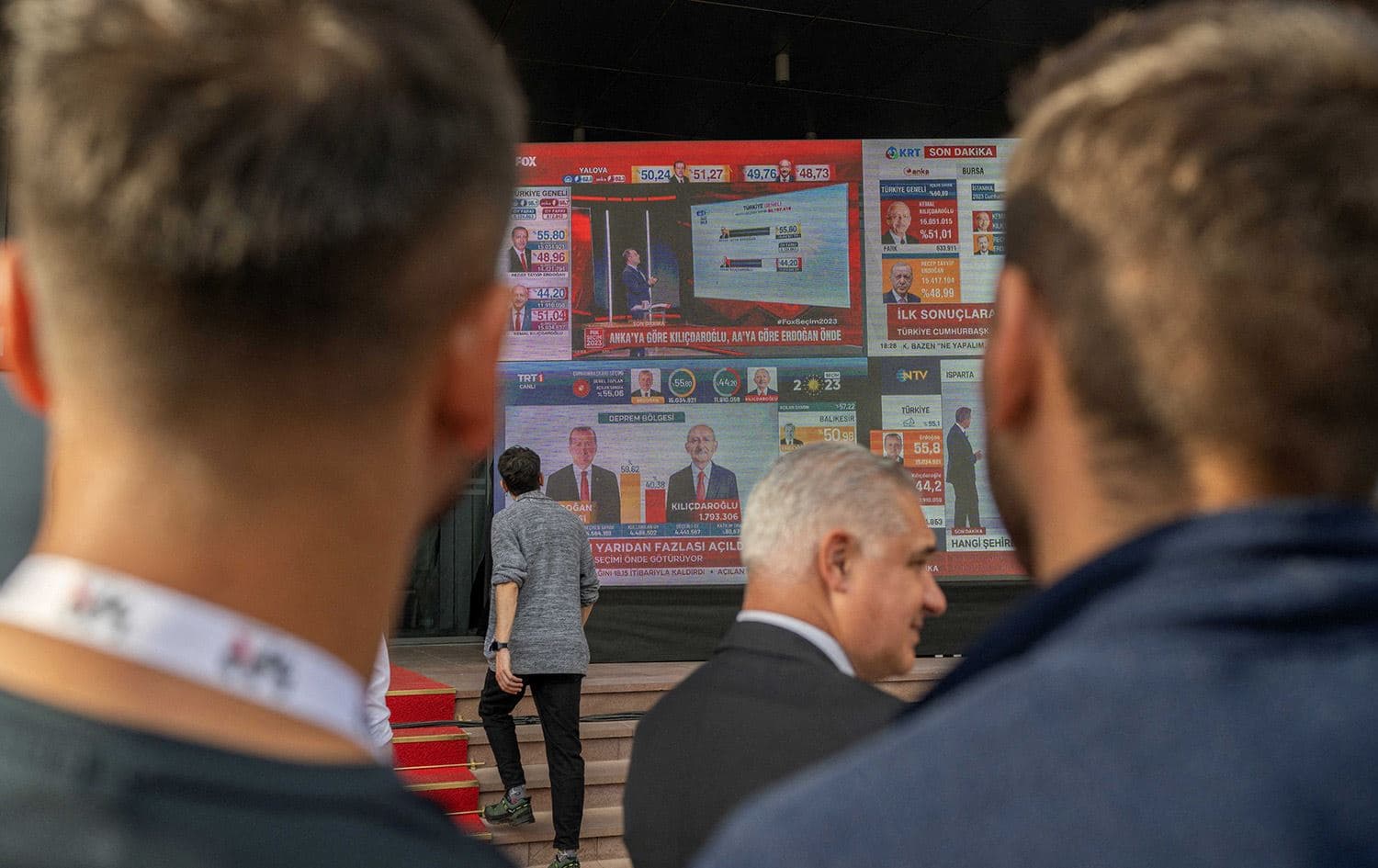 People watch results in front of Republican People's Party (CHP) during the ballots counting on the day of the second round of the presidential election in Ankara on May 28, 2023. Photo: Bulent Kilic/AFP