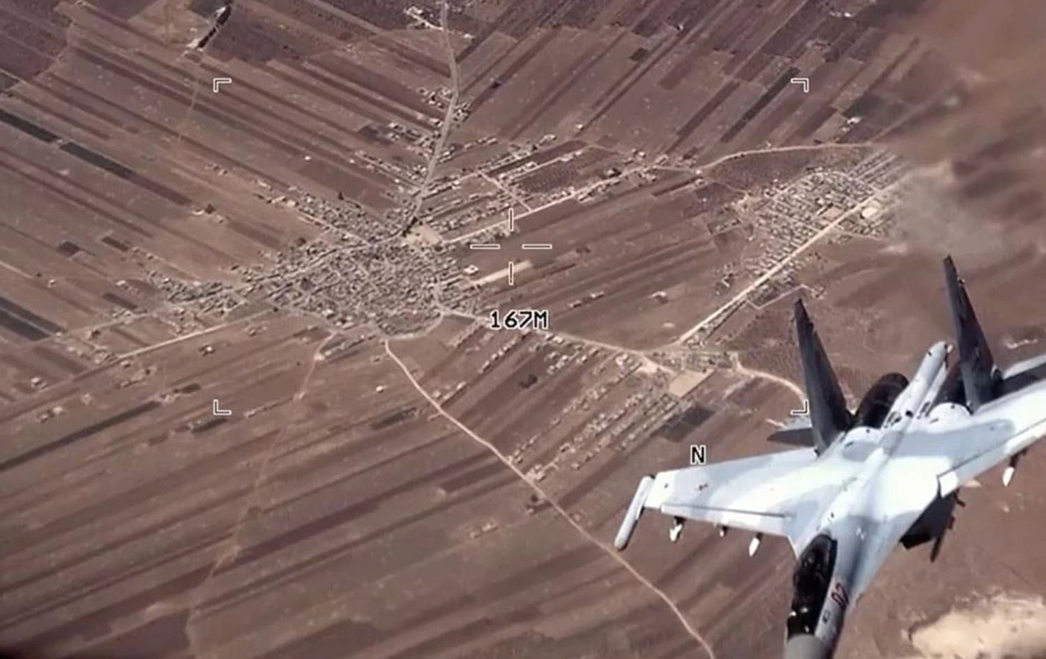 In this image from video released by the U.S. Air Force, a Russian Su-35 flies near a U.S. Air Force MQ-9 Reaper drone on July 5, 2023, over Syria. U.S. officials say that a Russian fighter jet flew very close to a manned U.S. surveillance aircraft over Syria Sunday, July 16, 2023. Photo: US Air Force/AP