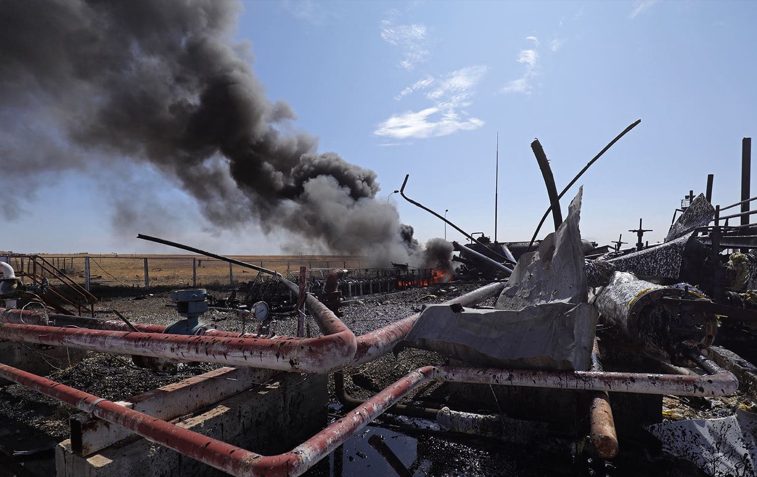 The aftermath of a Turkish strike on the Babasi oil facility in the countryside of al-Qahtaniya in Syria's Kurdish-controlled northeastern Hasakeh province on October 6, 2023. Delil souleiman/AFP