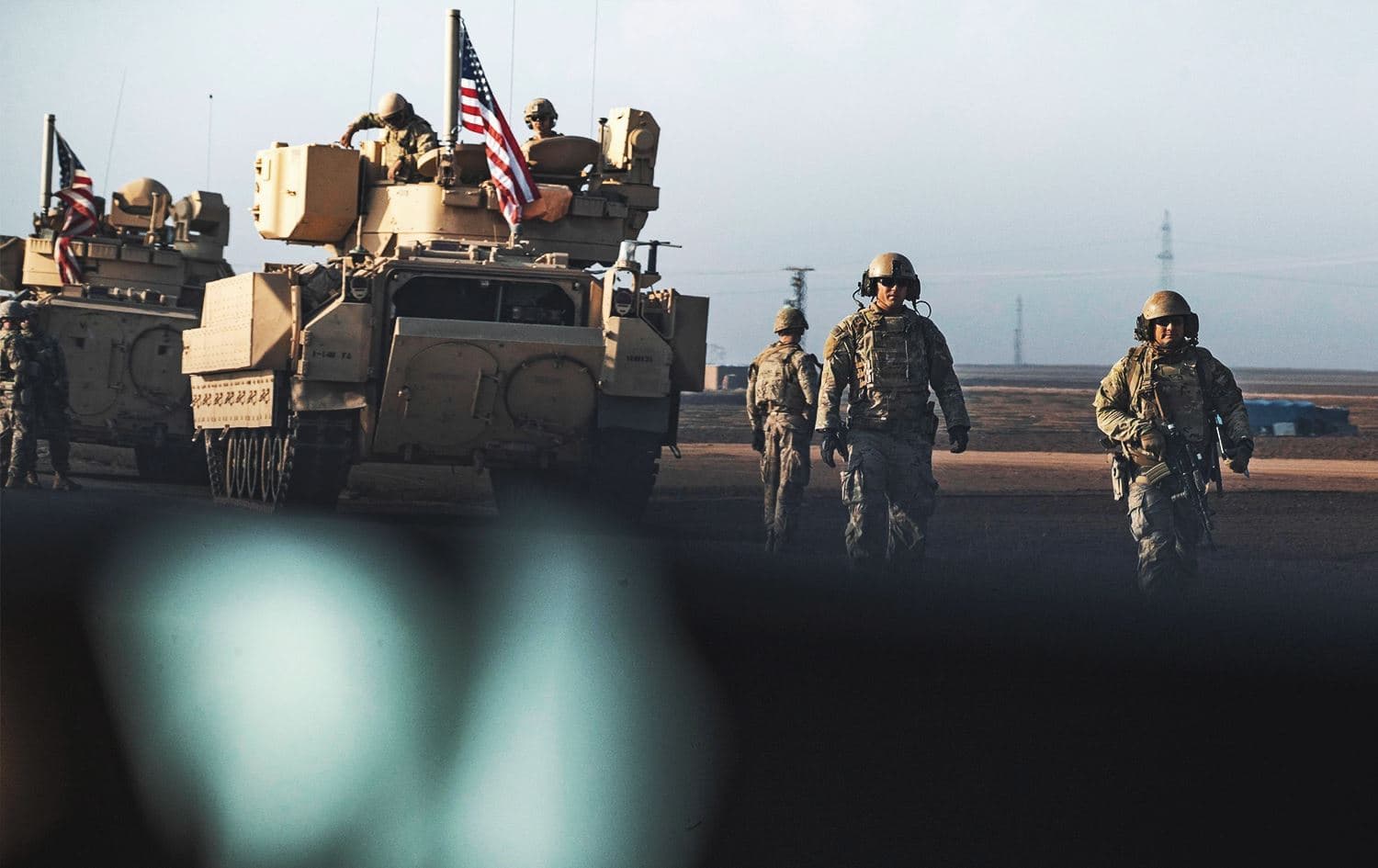 U.S. forces patrol the countryside of Rumaylan in Syria's northeastern Hassakeh province near the border with Turkey on December 4, 2022. Photo: AFP
