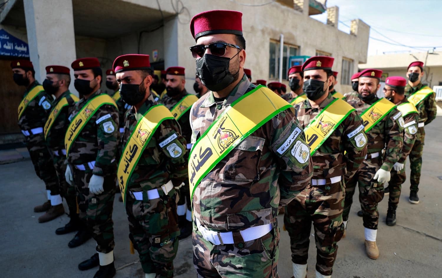Members of the Kataib Hezbollah, attend the funeral of a fighter killed in a US strike earlier in the day, during a funeral in Baghdad on November 22, 2023. Photo: Ahmad al-Rubaye/AFP