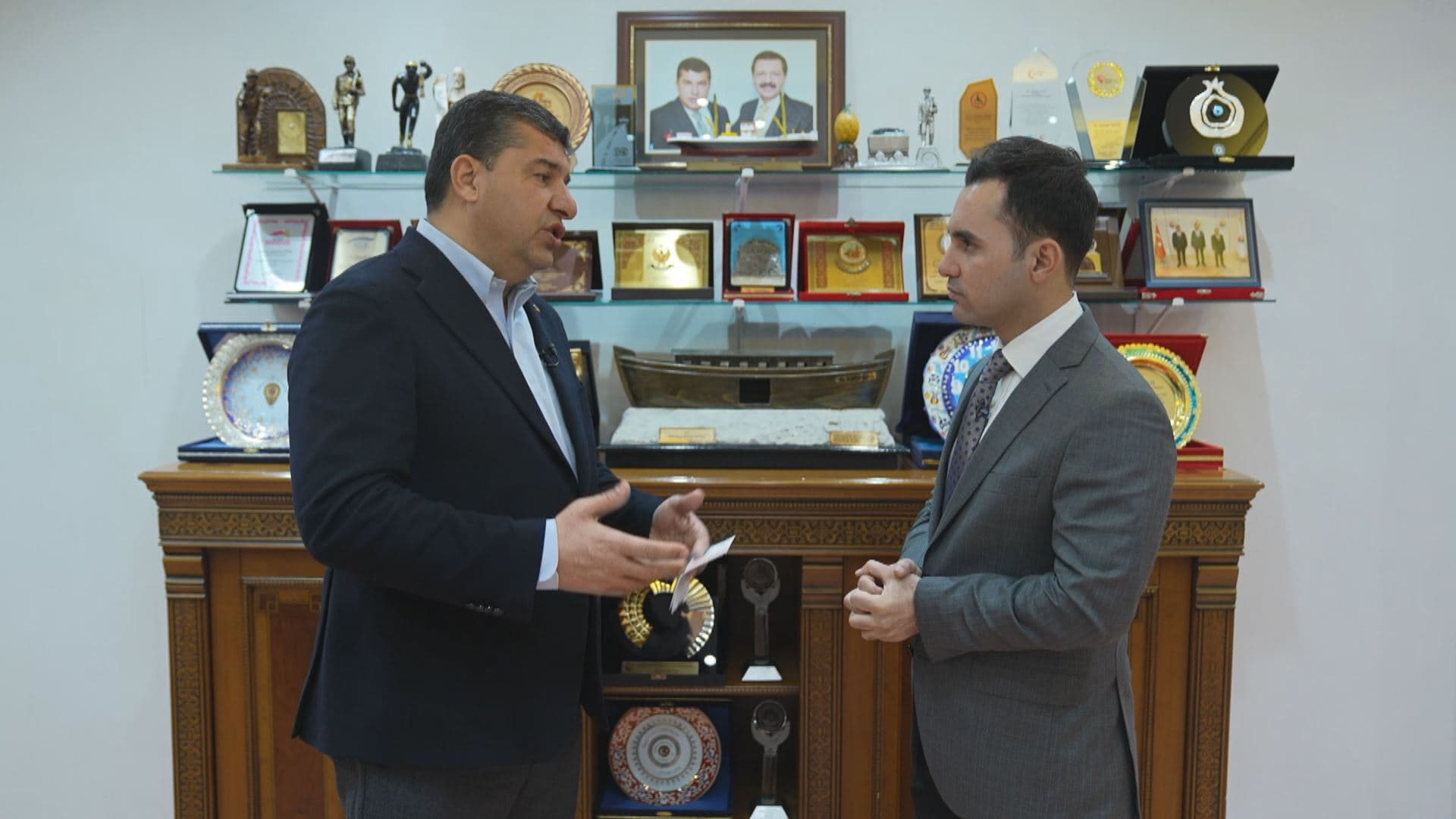 Osman Gelis, the head of Sirnak’s Chamber of Commerce, (left) speaks to Rudaw's Nwenar Fatih in Sirnak on March 12, 2024. Photo: Rudaw