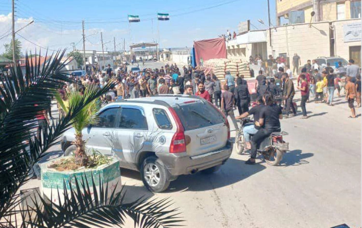 Prostesters took to the streets of Afrin on July 1, 2024. Photo: SOHR
