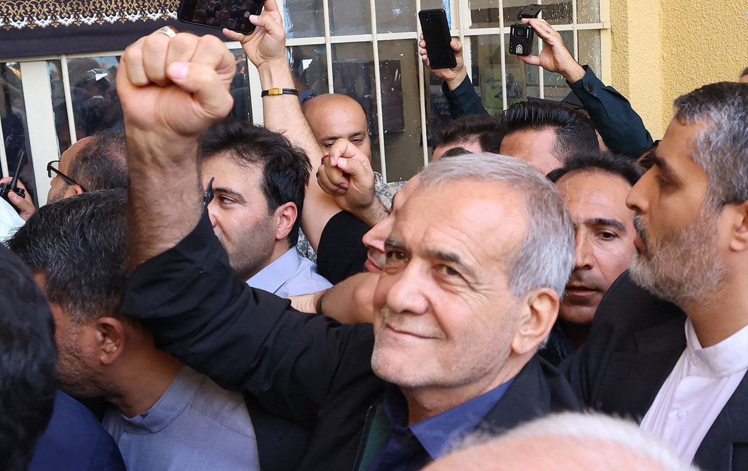Iranian reformist candidate Masoud Pezeshkian reacts after casting his ballot during the presidential runoff elections in Shareh Qods, west of Tehran on July 5, 2024. Photo: Atta Kenare/AFP