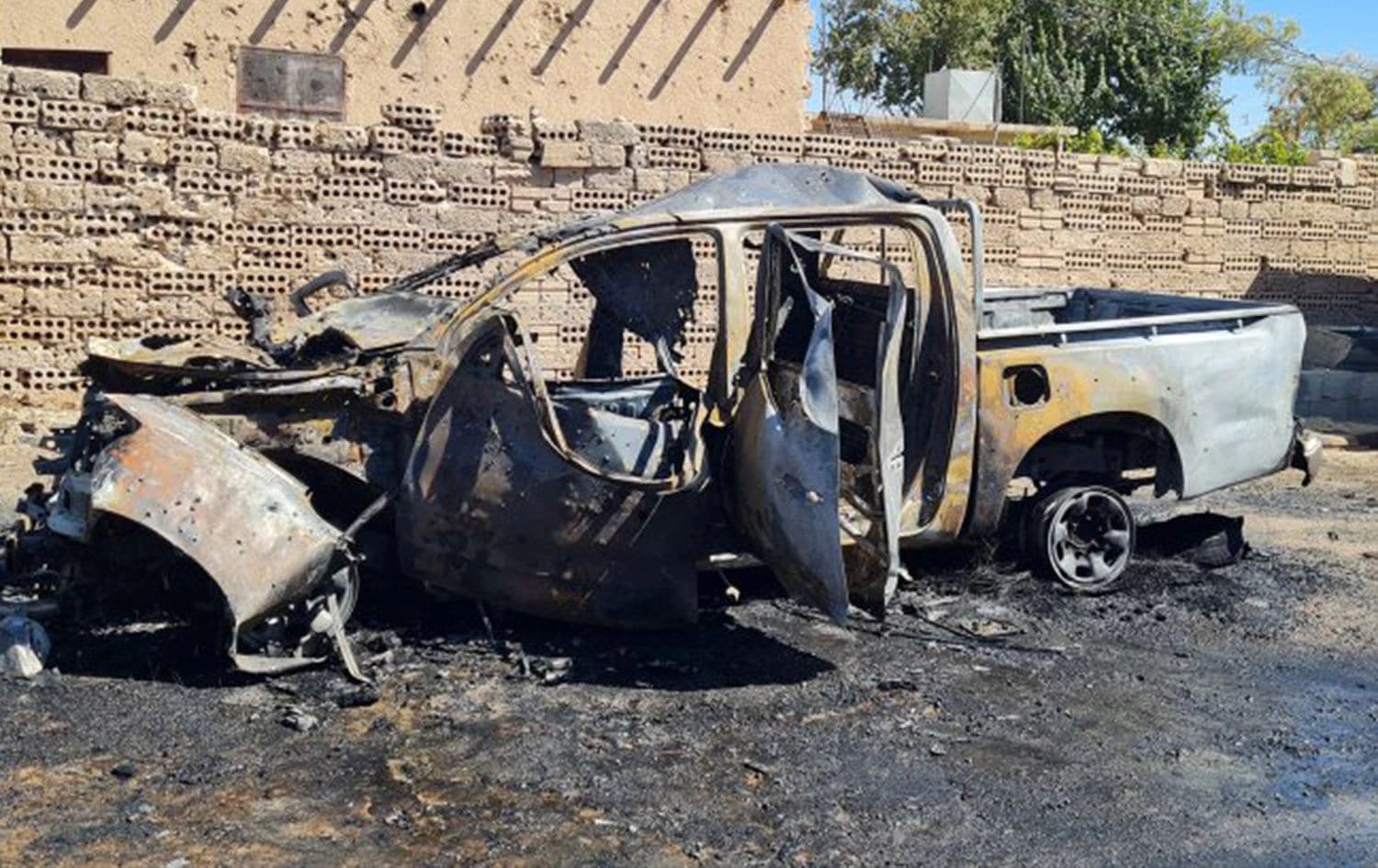 The aftermath of a car explosion in Qamishli, northeast Syria (Rojava) in front of the Umm al-Fursan prison complex on September 3, 2024. Photo: ANHA