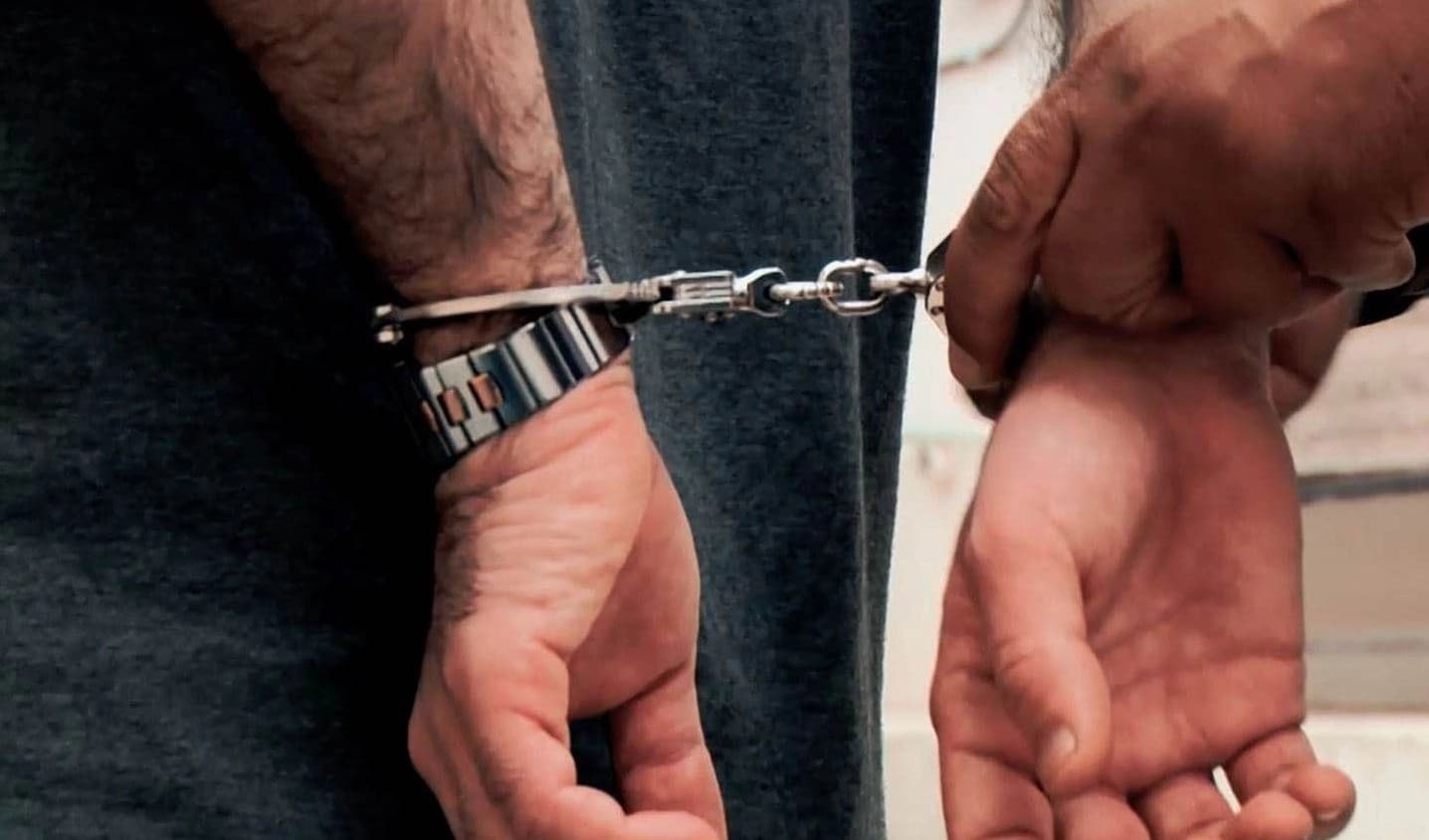 A handcuffed man. Photo: Rudaw/file