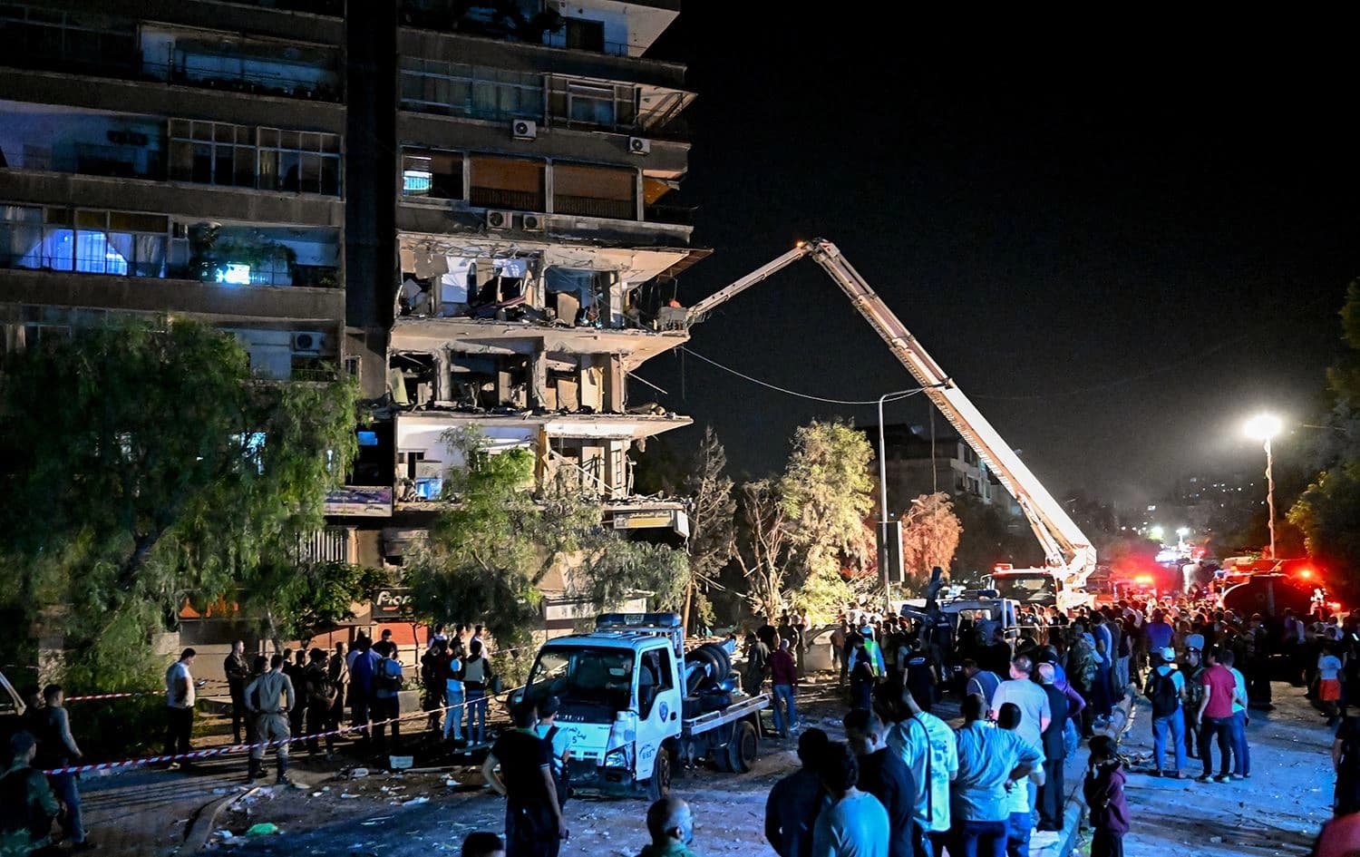 A view of a residential building hit by a reported Israeli airstrike in the Mazzeh suburb of Damascus, Syria, on October 8, 2024. Photo: Louai Beshara/AFP