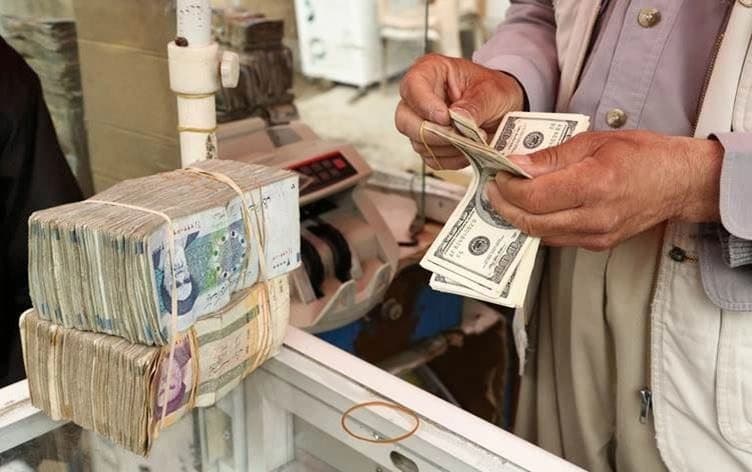 دۆلاری ئەمریکی و تمەنی ئێرانی
