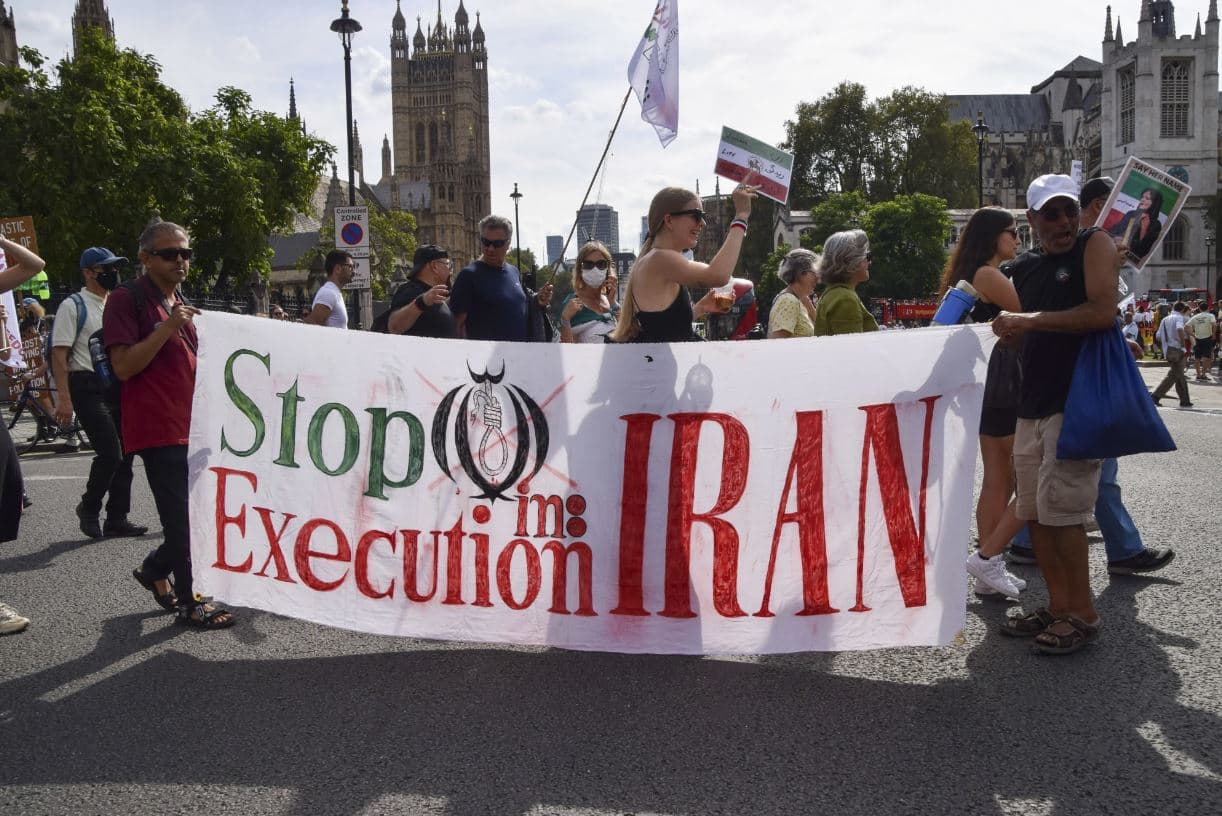 Protesters hold a banner reading 'Stop execution in Iran' during a demonstration in London in September 2023. Photo: AP