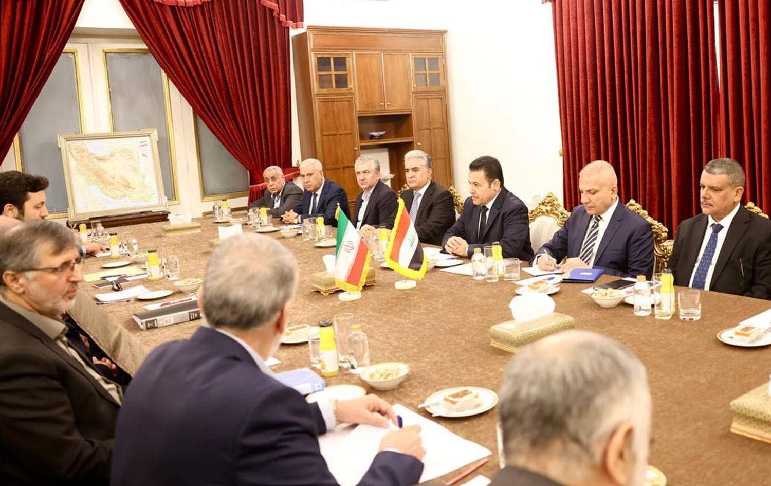 An Iraqi delegation headed by National Security Advisor Qasim al-Araji meeting with Iran's Supreme National Security Council Ali Ahmad Akbarian in Tehran on November 11, 2024. Photo: Araji’s office