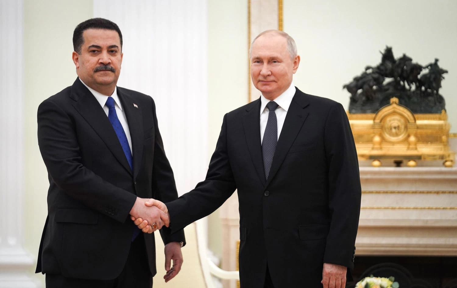 Iraqi Prime Minister Mohammed Shia’ al-Sudani (left) is received by Russian President Vladimir Putin (right) in Moscow on October 10, 2023. Photo: PM Sudani’s office